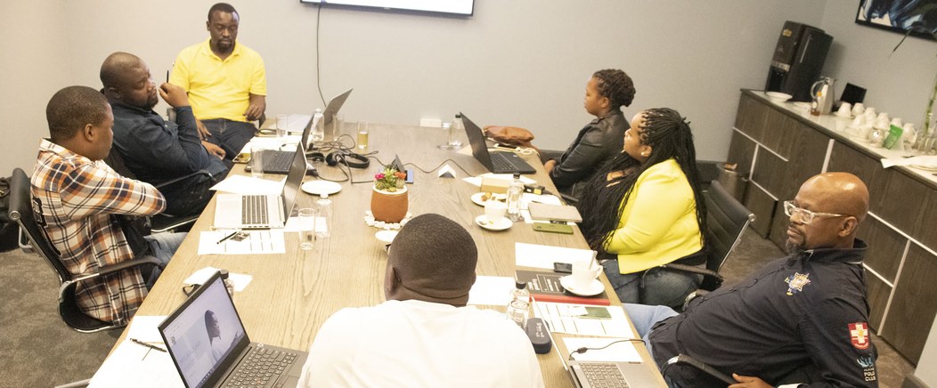 The Pace Online team in a planning meeting